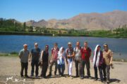 group photo of Adventure Iran tour in Ovan Lake