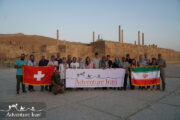 Swiss travelers on a group tour of Iran in Persepolis