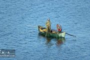 boat mans in Zarivar lake - Iranian kurdistan