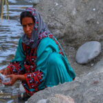 A lady in Palm grove Qasreqand- Chabahar Baluchestan Iran