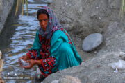 A lady in Palm grove Qasreqand- Chabahar Baluchestan Iran